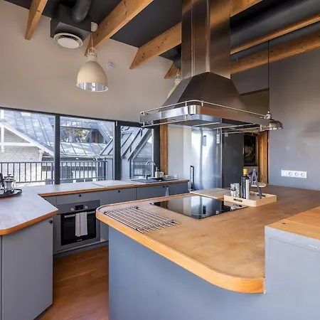Апартаменты Cozy Riverside Penthouse Рига