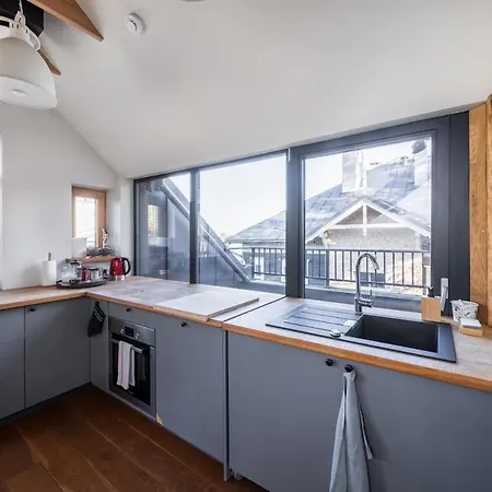 Cozy Riverside Penthouse Апартаменты