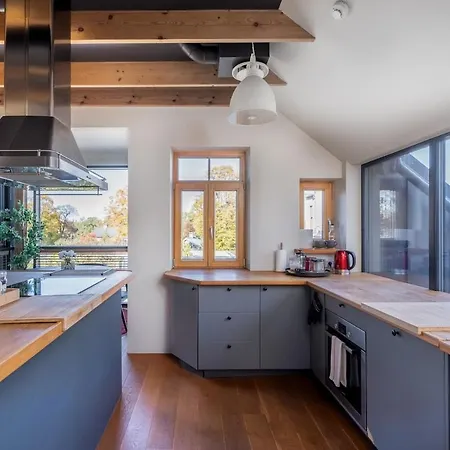 Cozy Riverside Penthouse Апартаменты Рига
